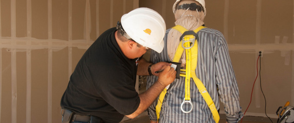 Man connecting safety gear