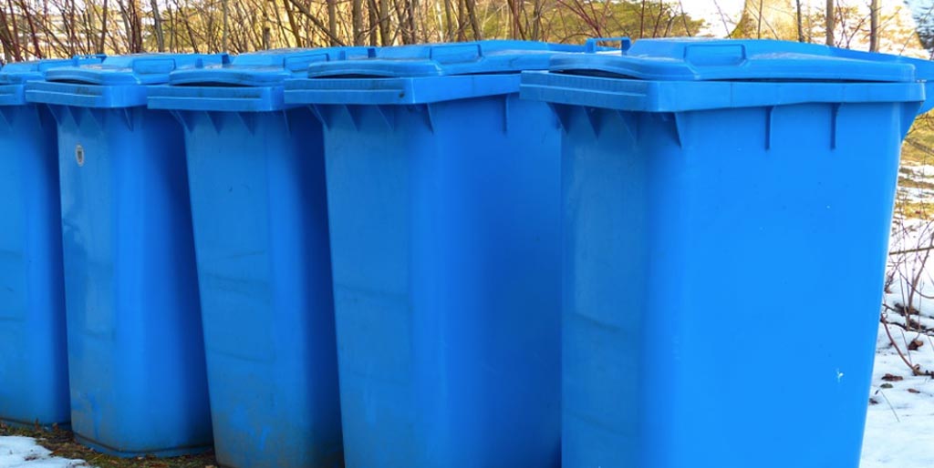 Row of blue trashcans