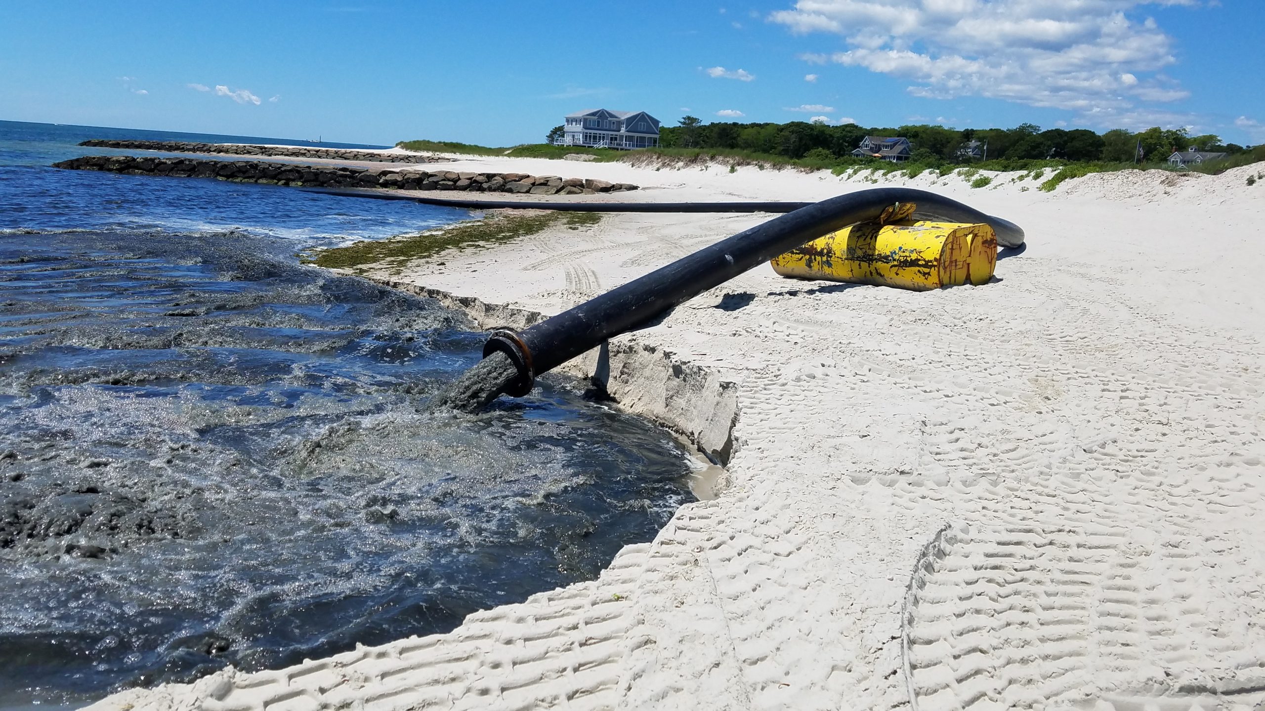 Dredging restarted at Red River Beach.