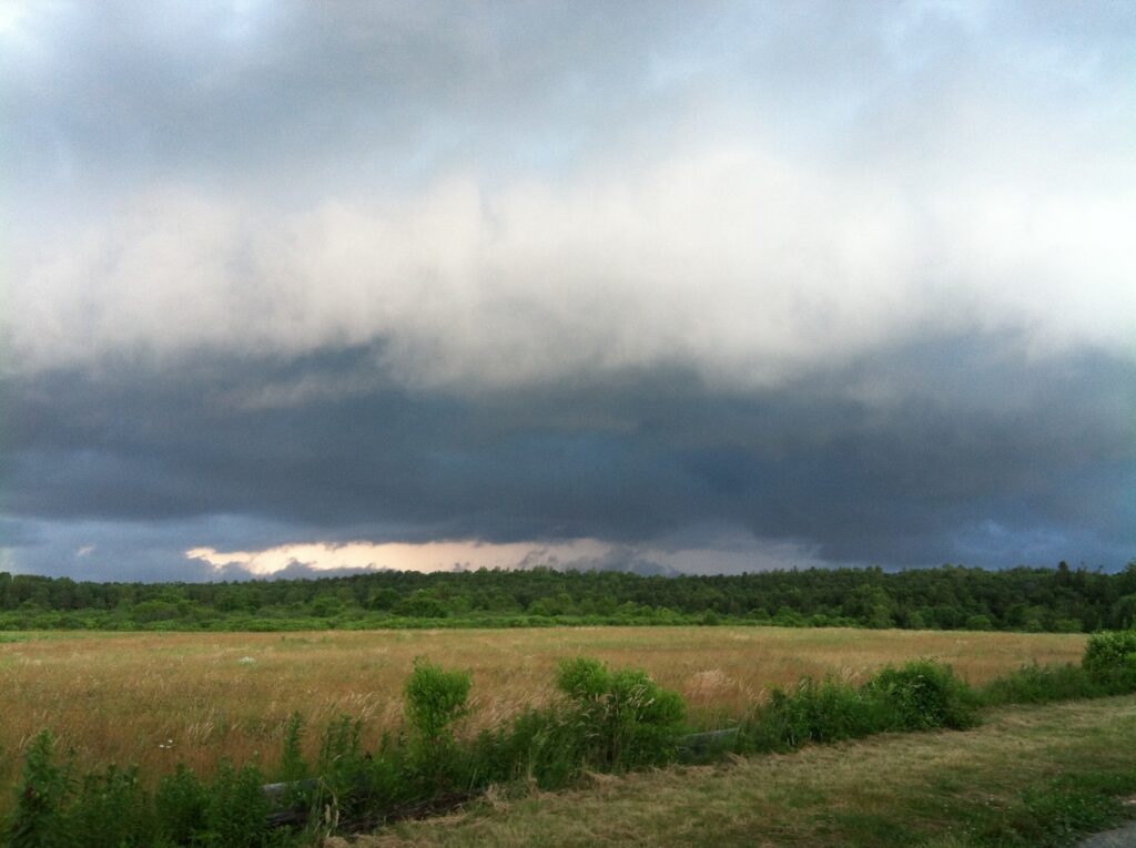 Image of dark storm clouds over Cape Cod Airfield.