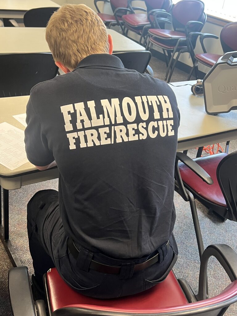 A member of the Falmouth Fire Rescue Department completes documentation during annual respiratory protection fit testing.